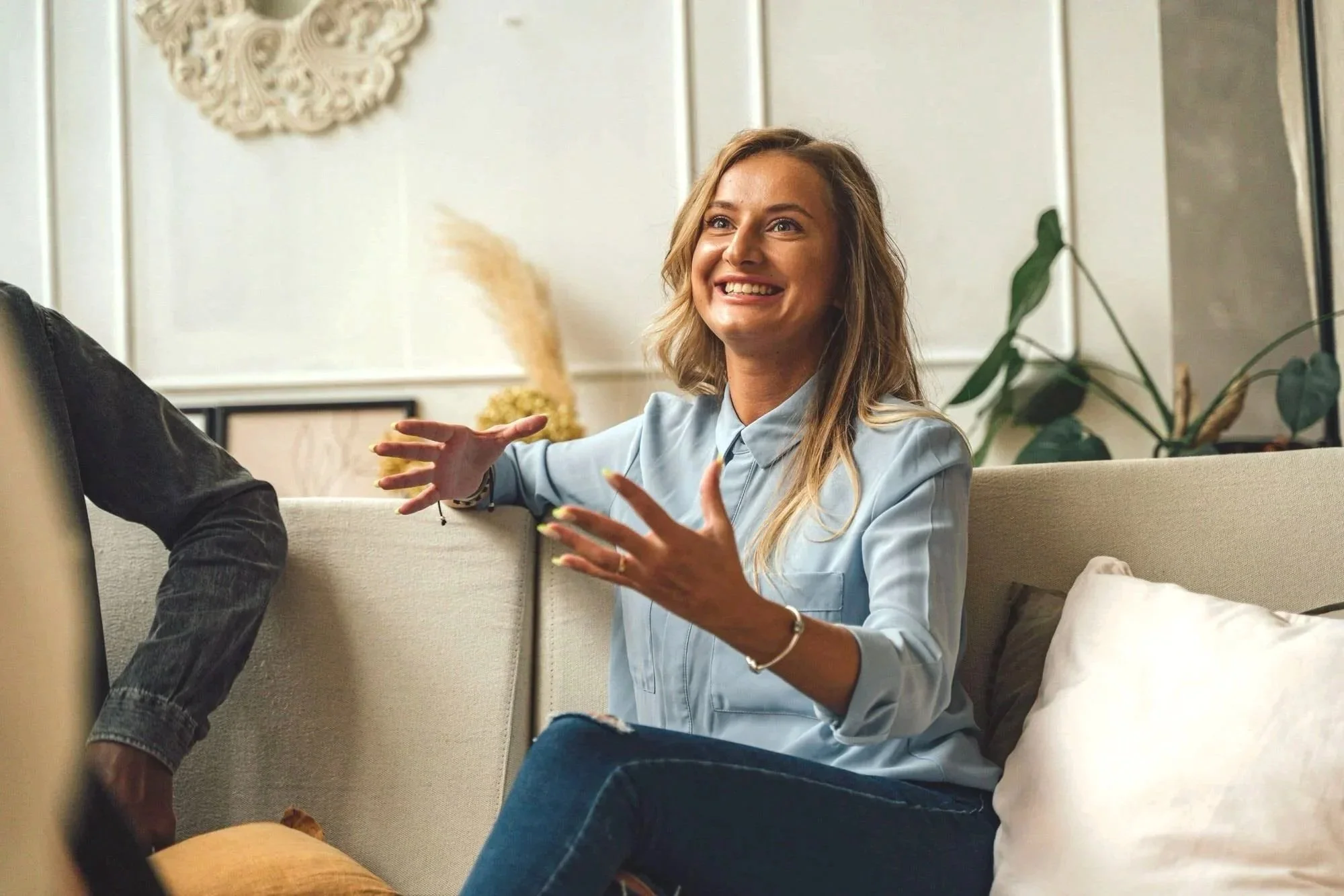 A person talking emphatically during a therapy session.