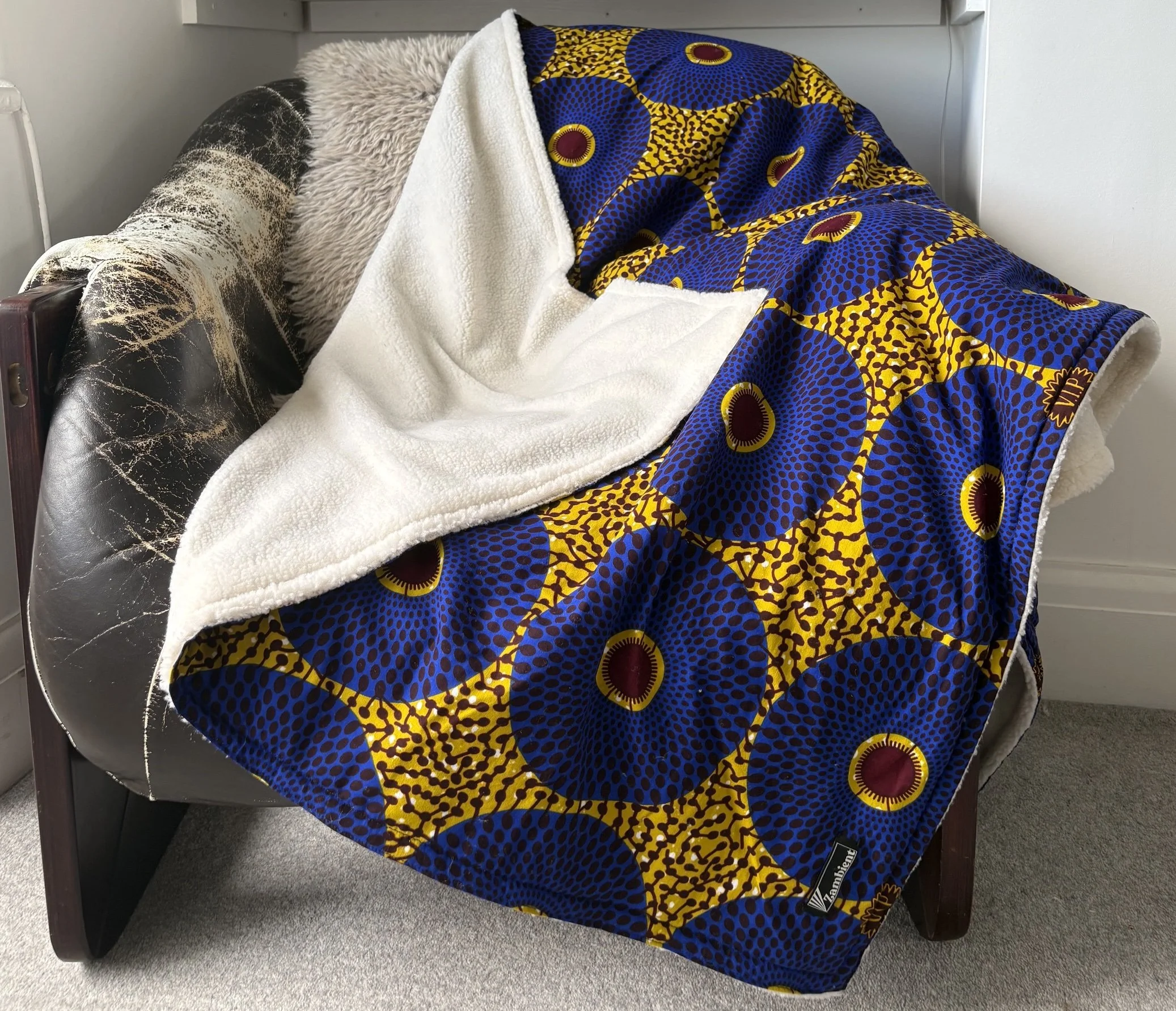 Blue Circles Blanket Leather armchair.jpg