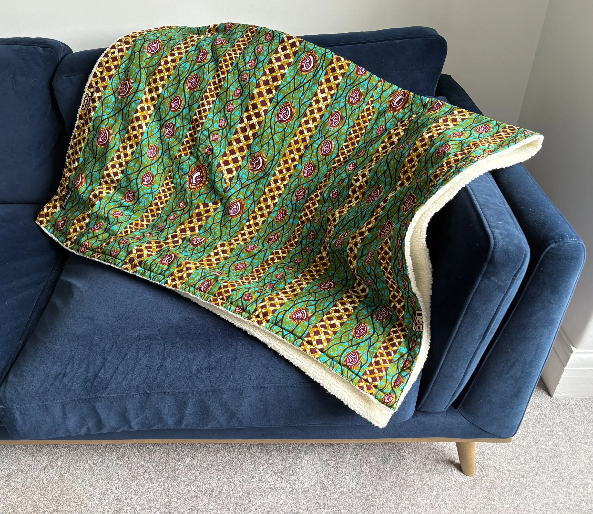 Anakara Blanket Eyes Blue Sofa.jpg