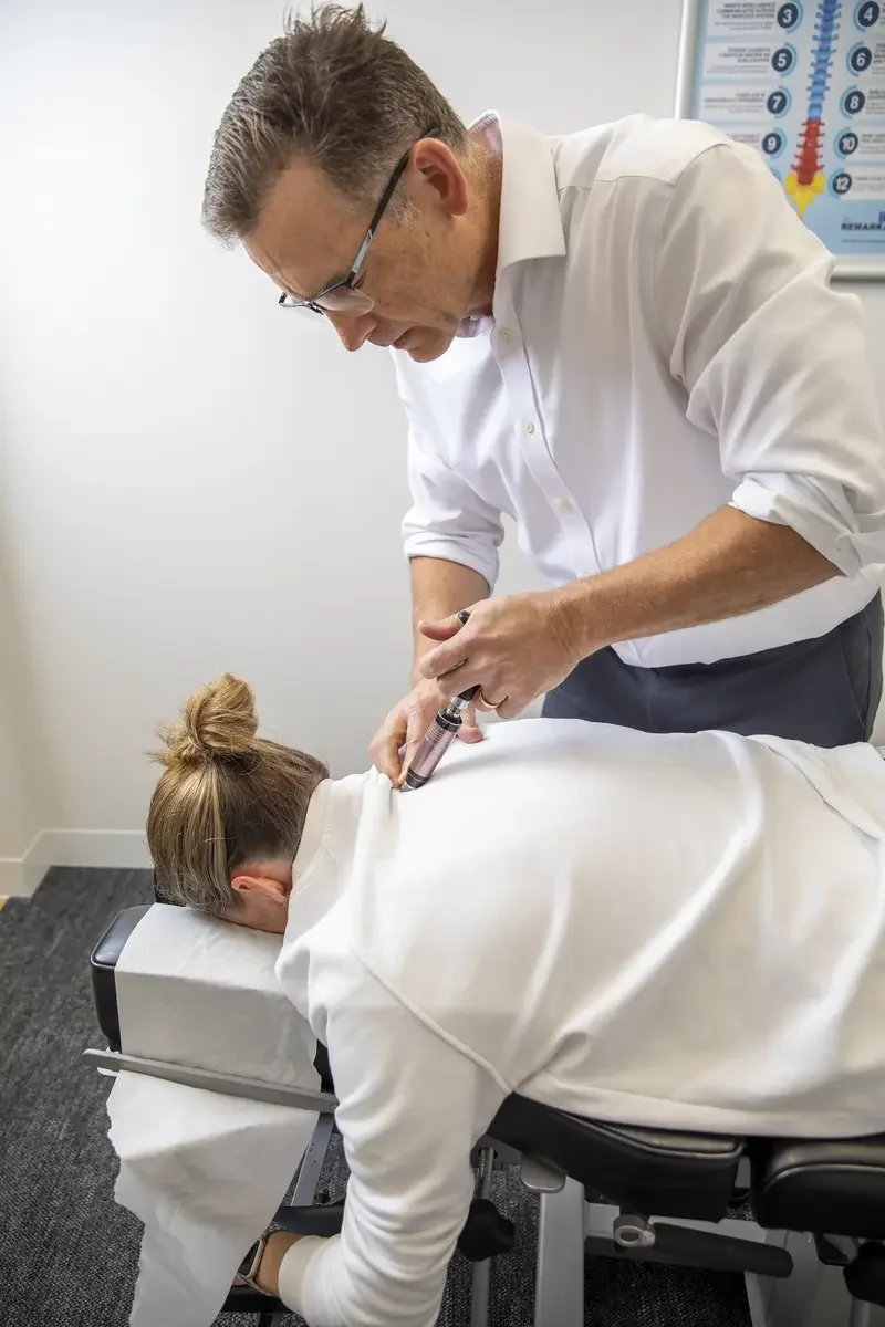 Chiropractic adjustment for back pain in Chatswood