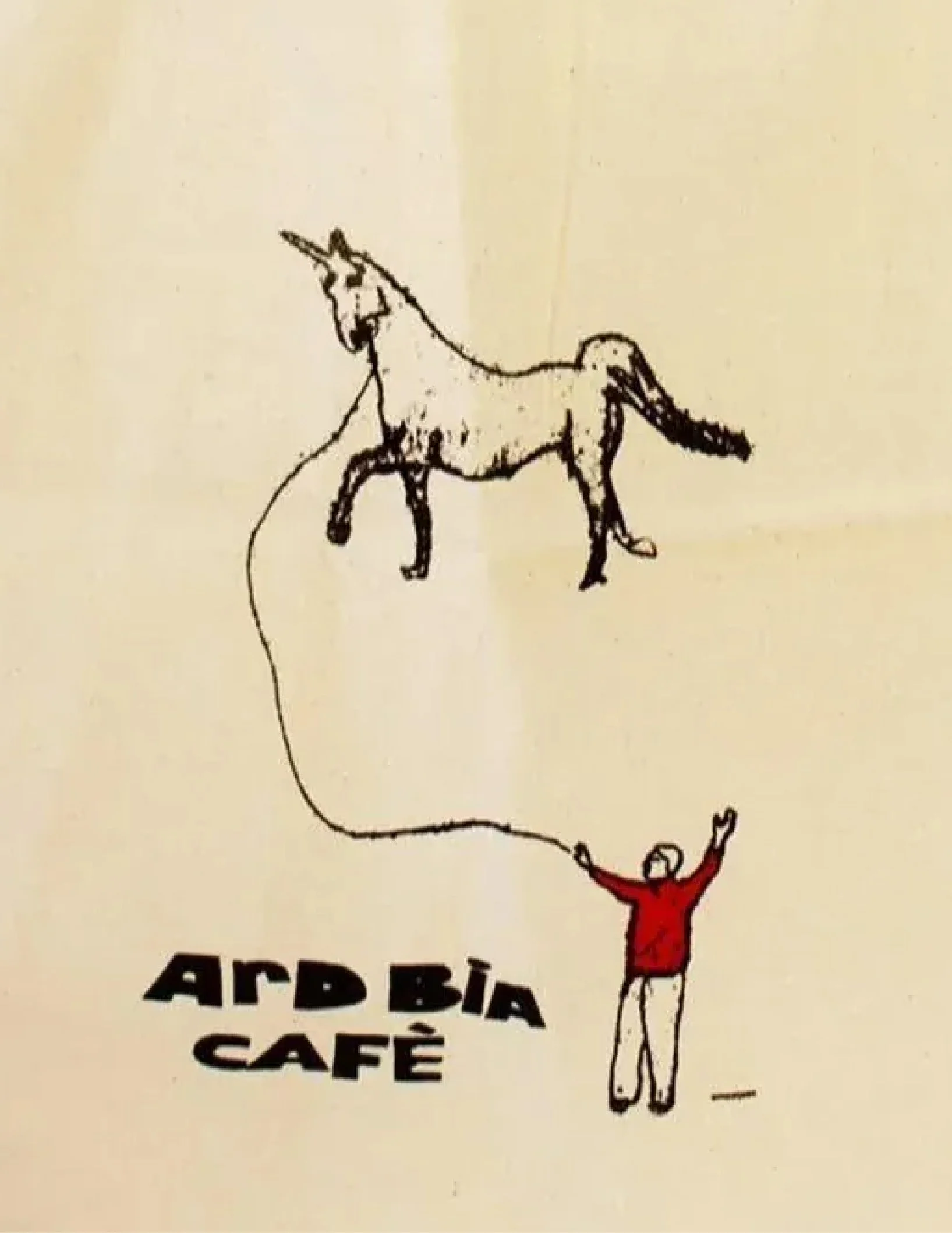 Line drawing of a person in red holding a string attached to a unicorn, with the words "ARDBIA CAFÉ" partially visible below.