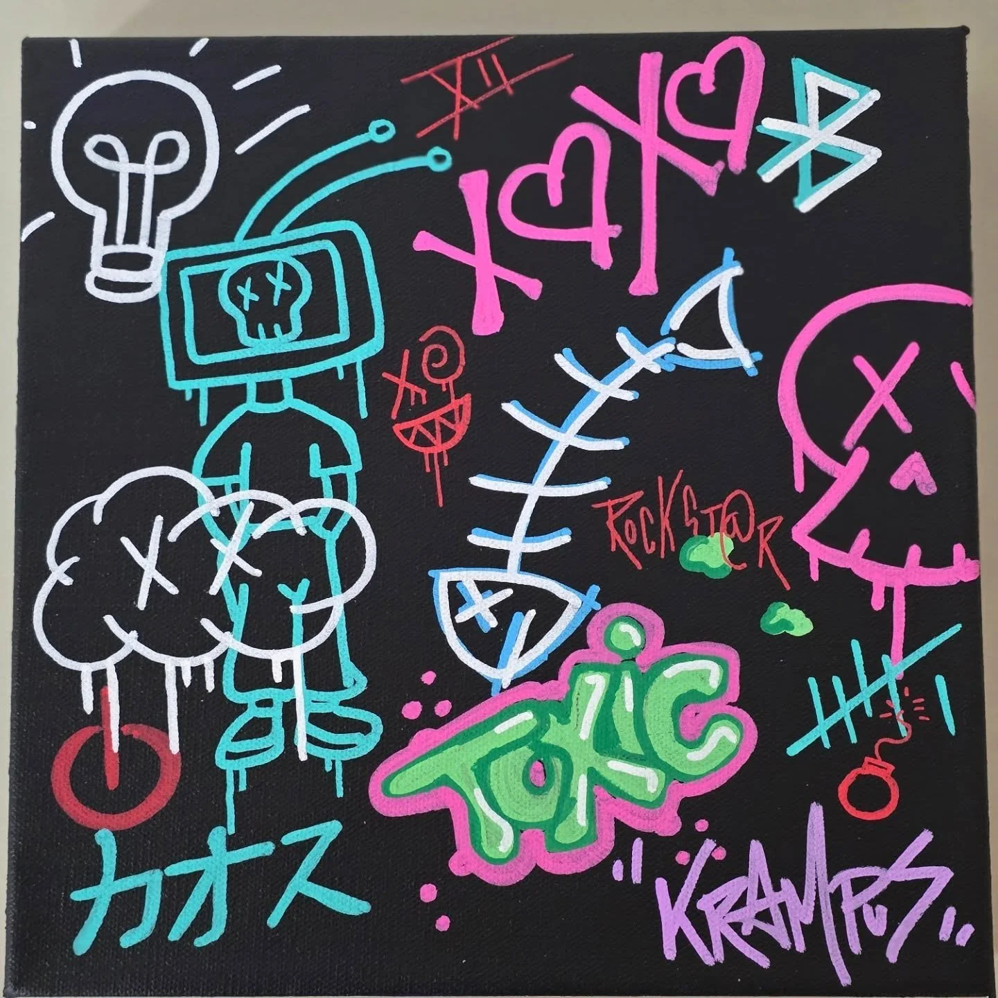 Neon graffiti-style artwork featuring cartoonish skulls, a brain, a television with a skull on the screen, a light bulb, the words "FUCK TERROR", and various doodles and symbols in bright colors on a black background.