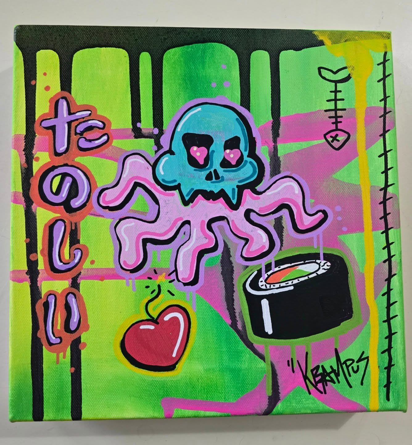 Street art painting of a blue skull with pink tentacles, a red heart, a spray paint can, and Japanese characters on a vibrant green, pink, and black background.