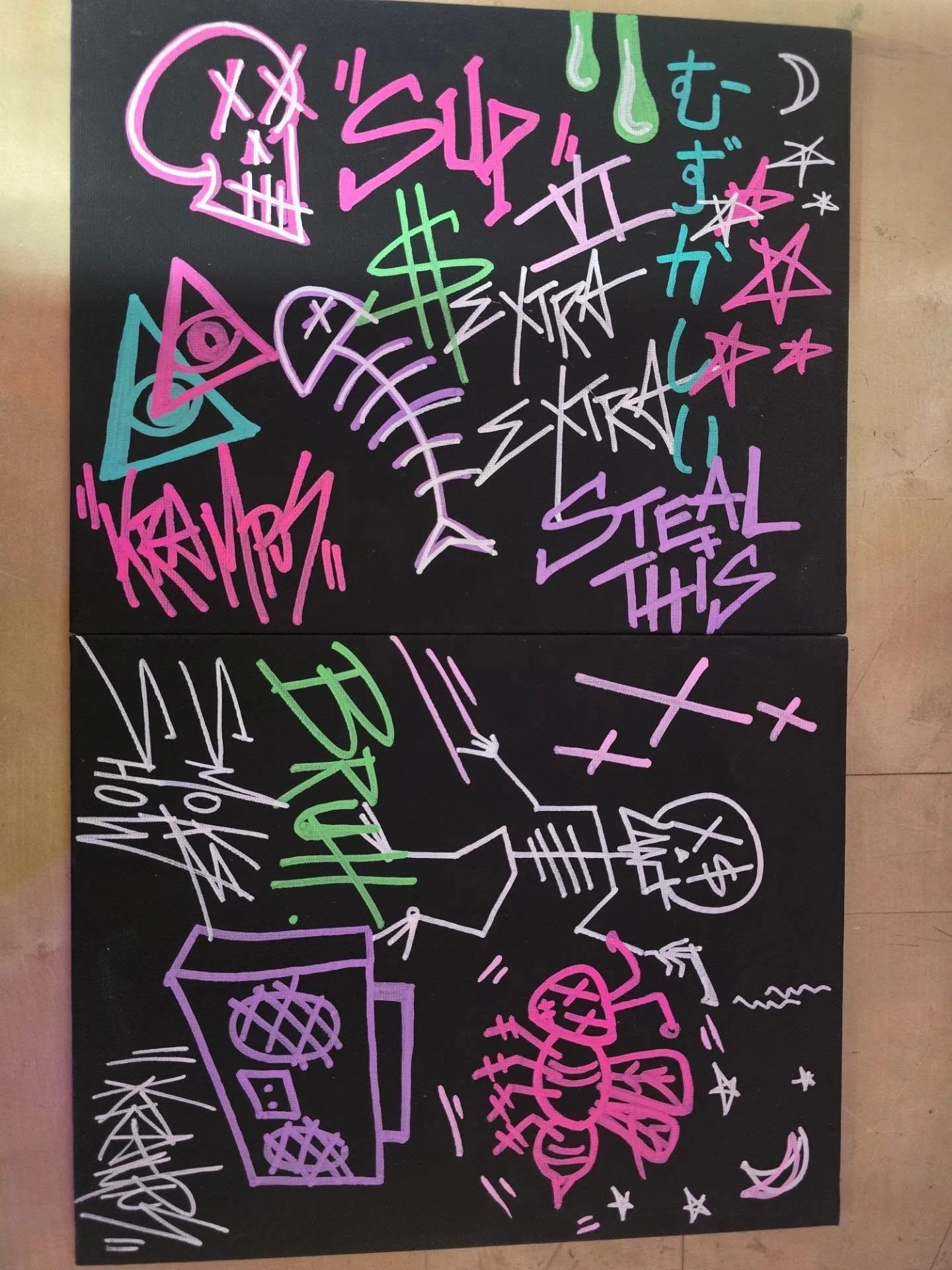 Colorful graffiti-style doodles and words on a black background, including skulls, stars, dollar signs, a gun, and phrases like 'STEAL THIS' and 'SUB' in neon colors.