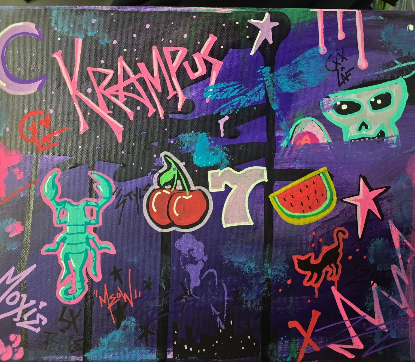 Abstract colorful graffiti-style artwork featuring a green skull, a turquoise crab, a pair of cherries, a watermelon slice, and various stars, doodles, and text in neon colors on a dark background.