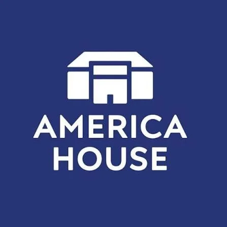 Logo of America House with a stylized house icon above the text 'AMERICA HOUSE' on a blue background.