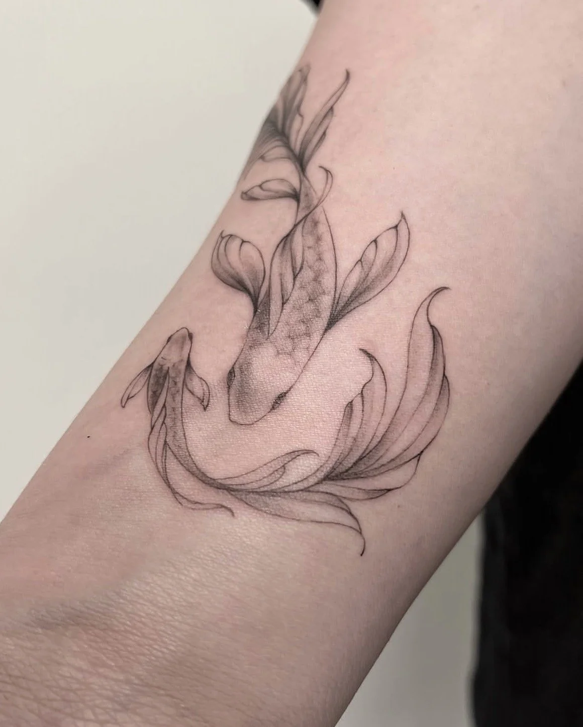 tatuaje peces por paula rosas en purezas tattoo gandía