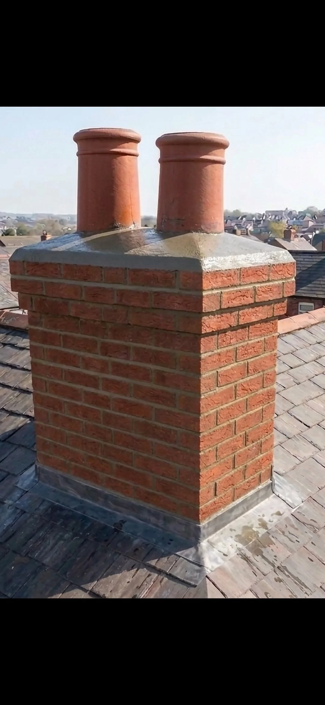 Chimney repointing and lead flashing repairs completed in West London.