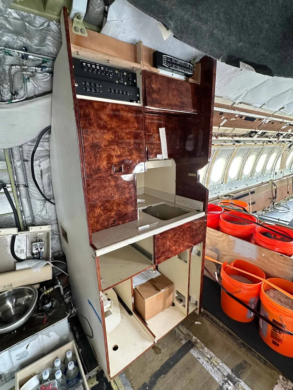 Falcon 900B galley cabinetry before