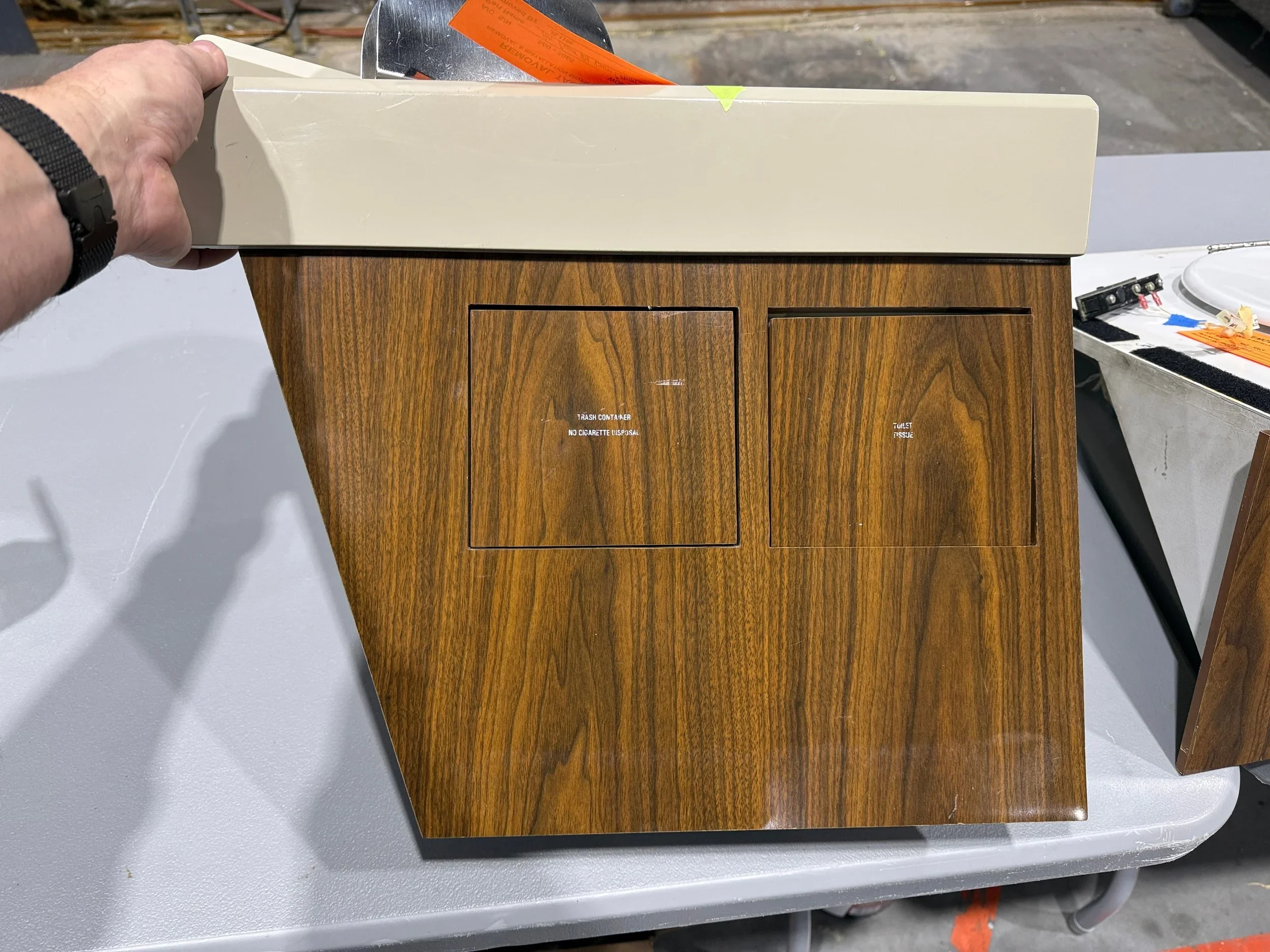 Citation Express 560XL millwork armresst trashcan before