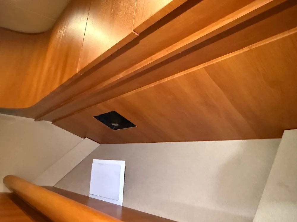 Under the cabinetry in a yacht wrapped with Di-noc
