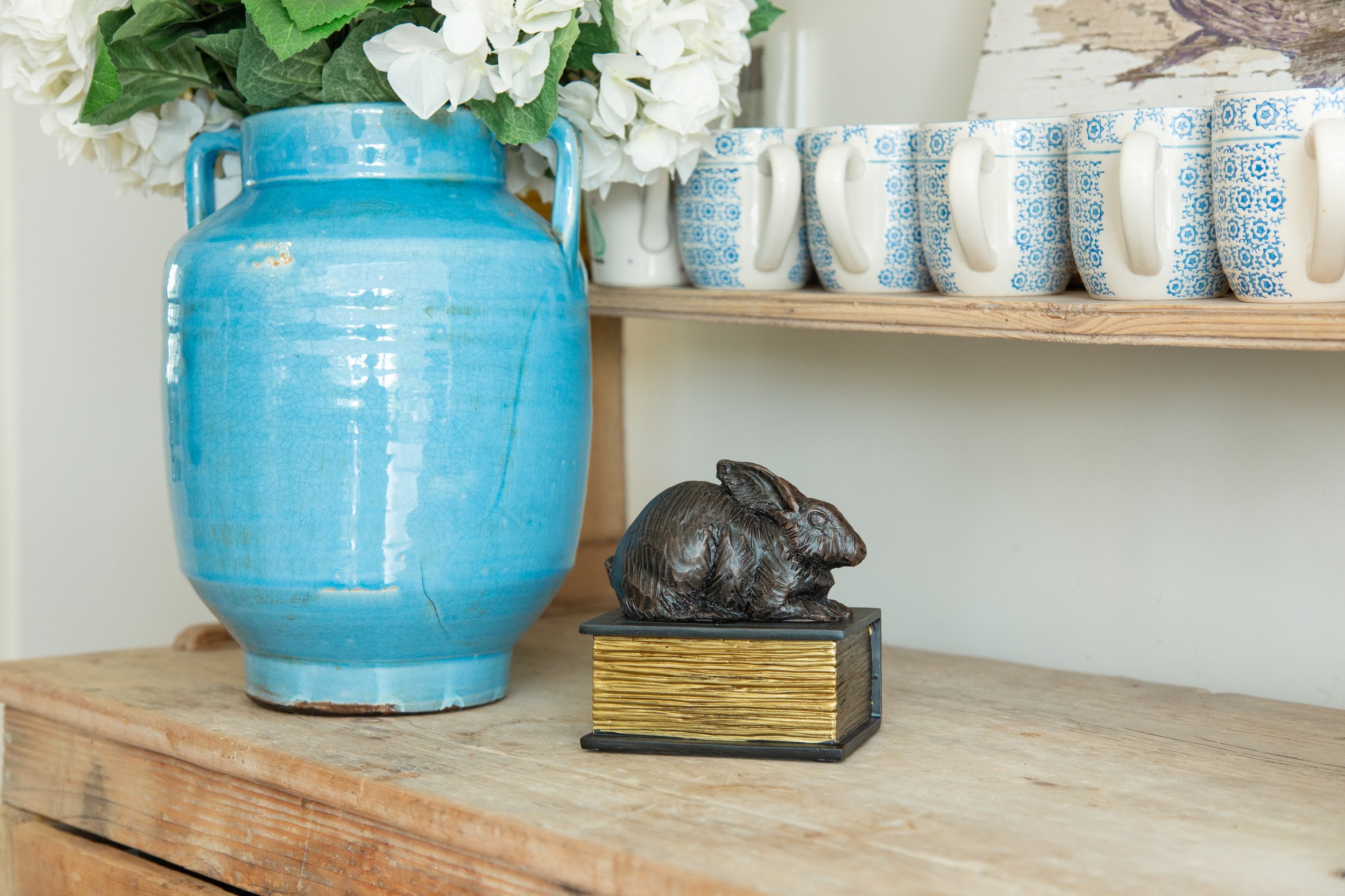 Rabbit on a Book Urn