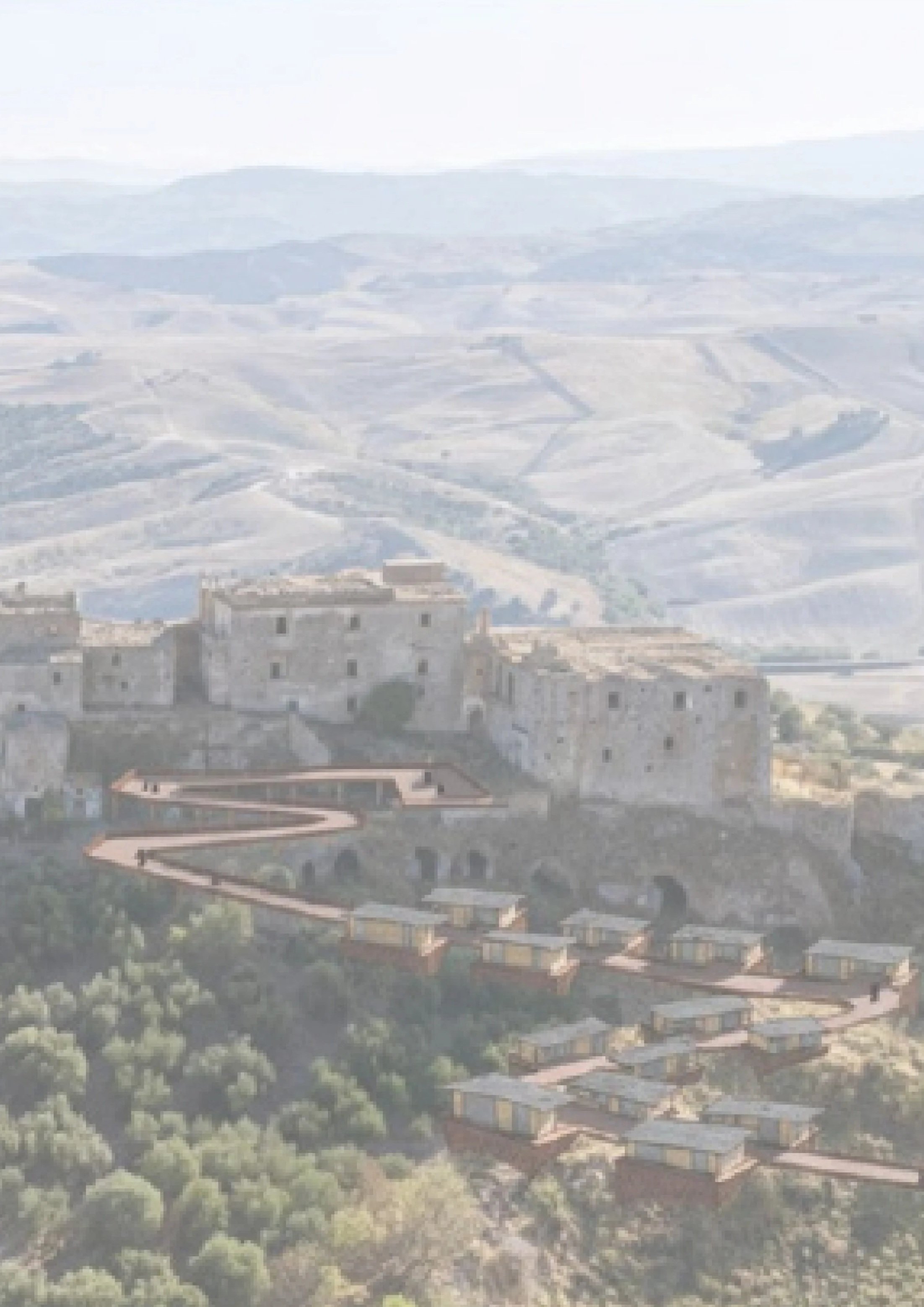 Hilly landscape with terraced fields and clusters of buildings in the foreground.