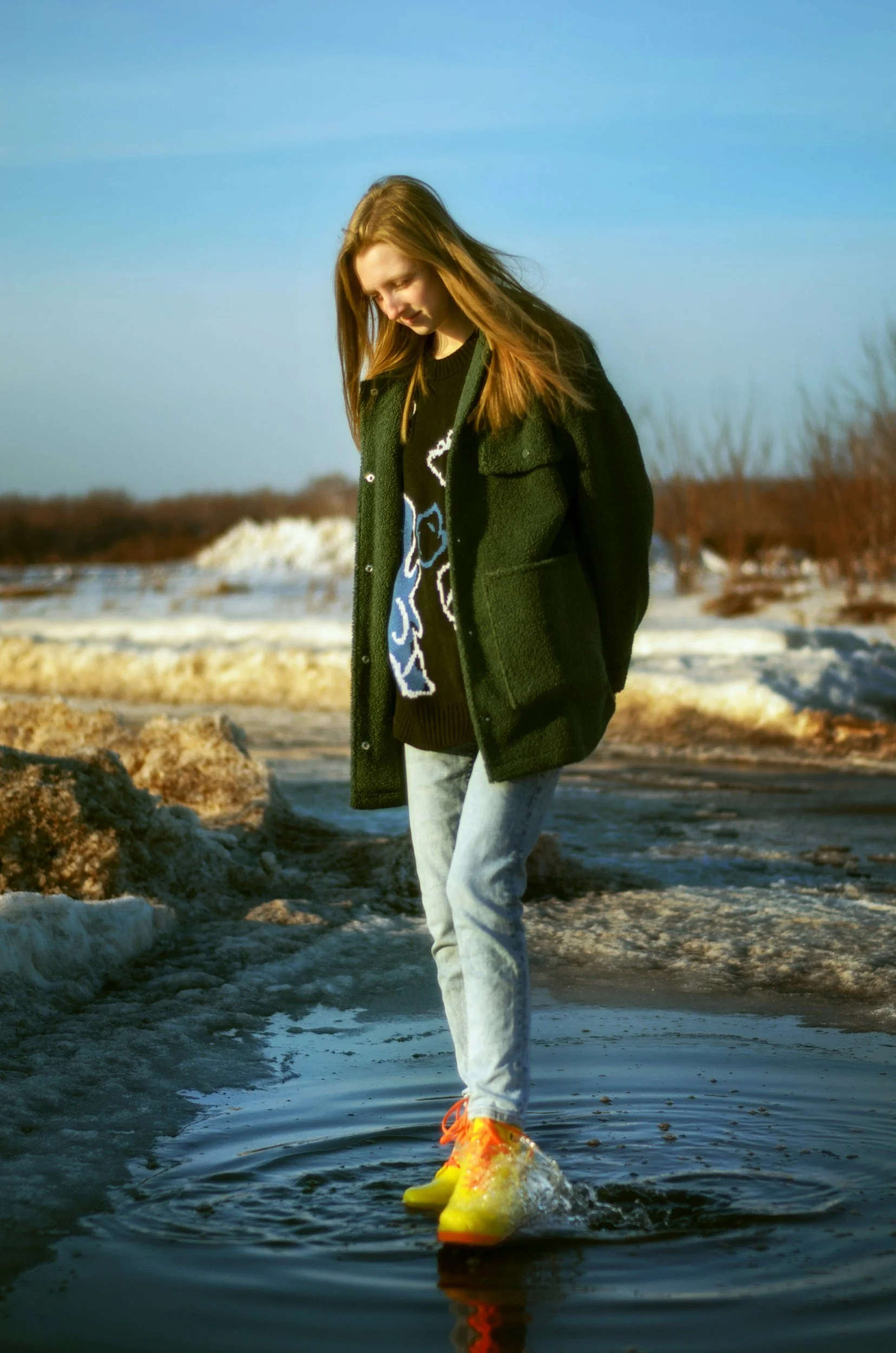 Teenage girl, looking down - figuratively and literally