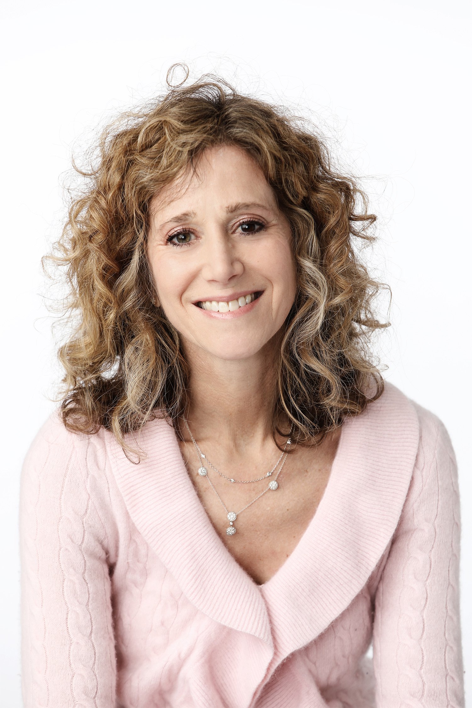 Dr Emily Gordon, therapist based in Natick, smiling at the camera