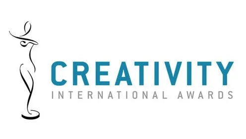 Logo de los premios Creativity International Awards con una figura estilizada y el texto 'CREATIVITY INTERNATIONAL AWARDS'.