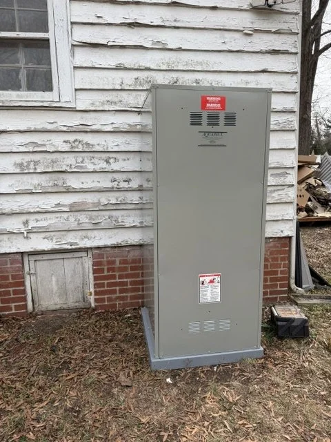 Exterior service connection at the meter on the side of a house