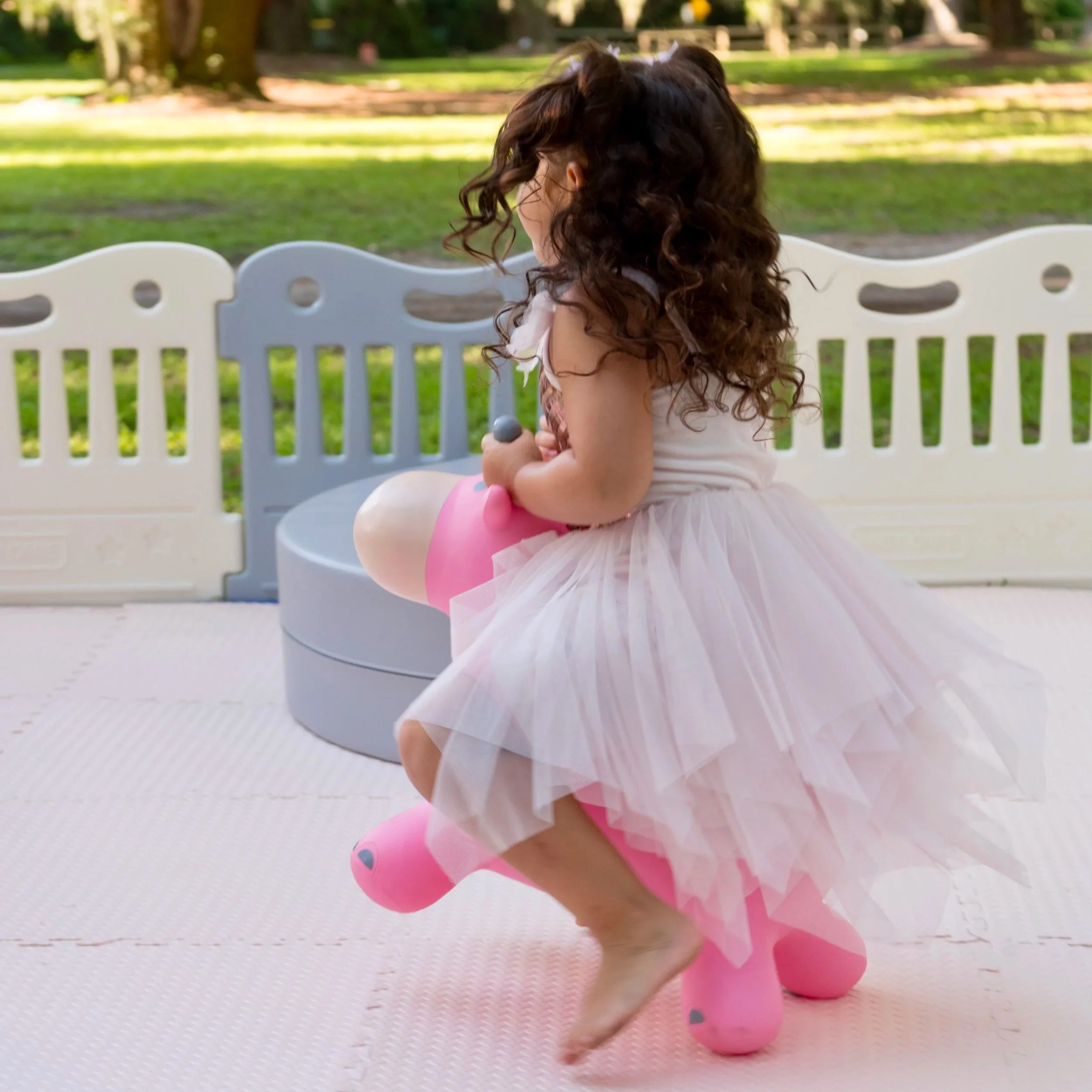 luxury soft play featuring a white bounce house, inflatable ball pit, white slide, foam blocks, and toddler play equipment in Jefferson County, West Virginia.