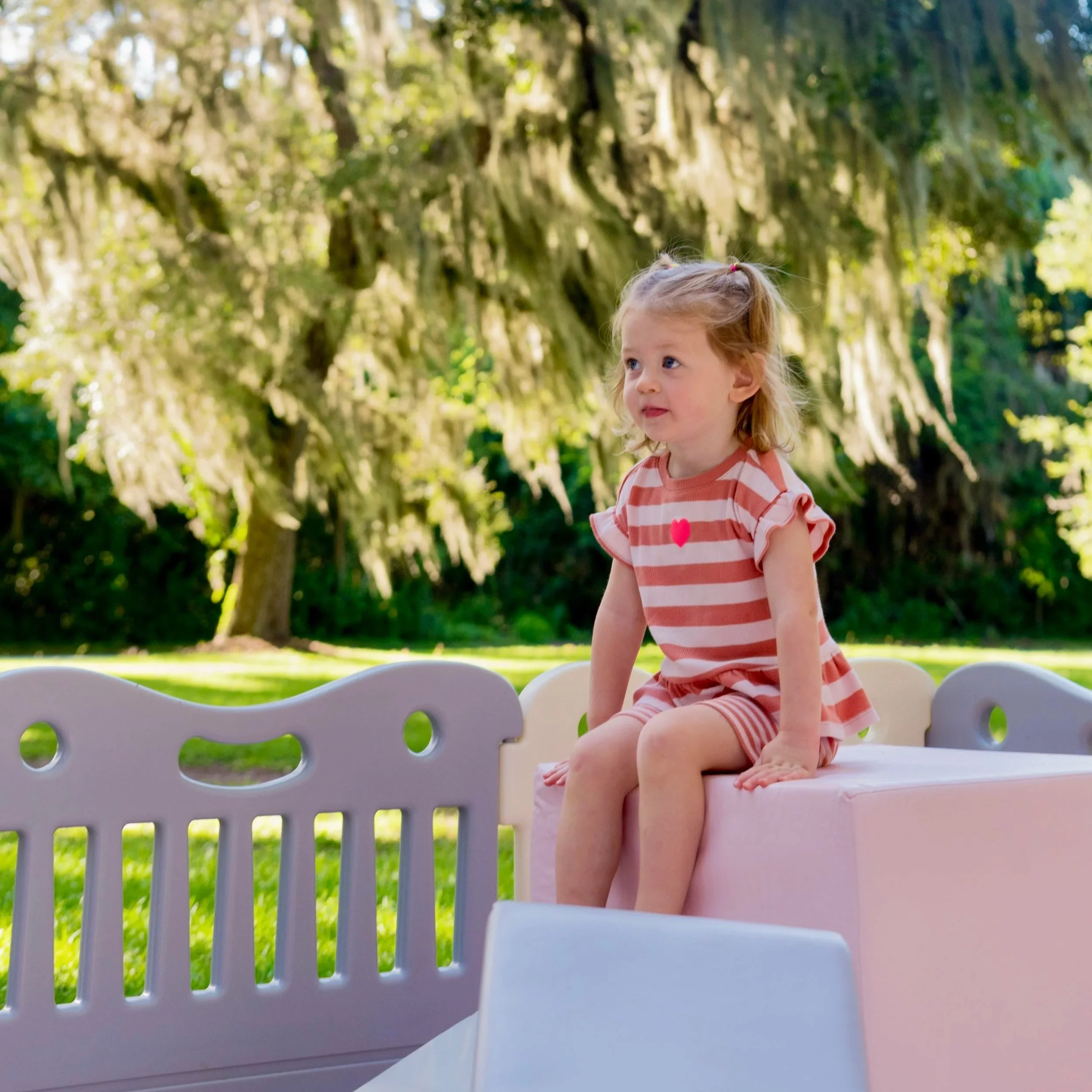 luxury soft play featuring a white bounce house, inflatable ball pit, white slide, foam blocks, and toddler play equipment in Jefferson County, West Virginia.