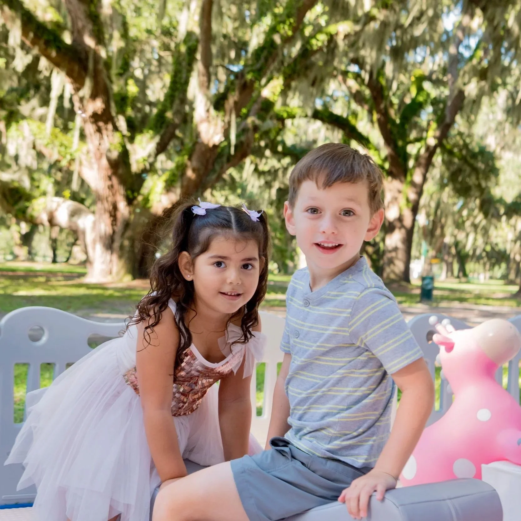 luxury soft play featuring a white bounce house, inflatable ball pit, white slide, foam blocks, and toddler play equipment in Jefferson County, West Virginia.
