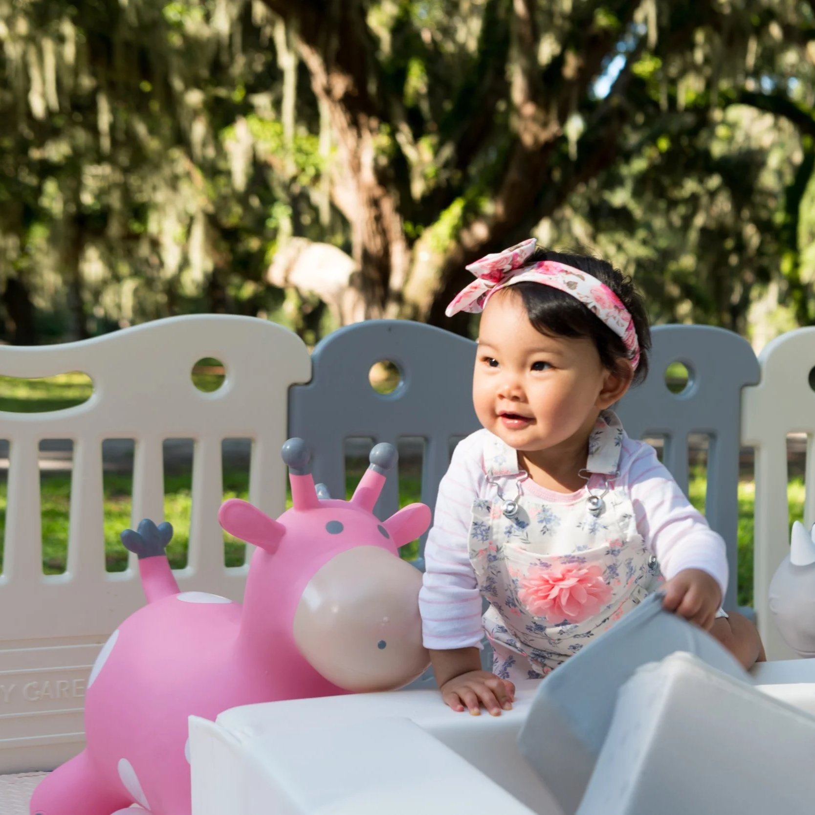 luxury soft play featuring a white bounce house, inflatable ball pit, white slide, foam blocks, and toddler play equipment in Jefferson County, West Virginia.