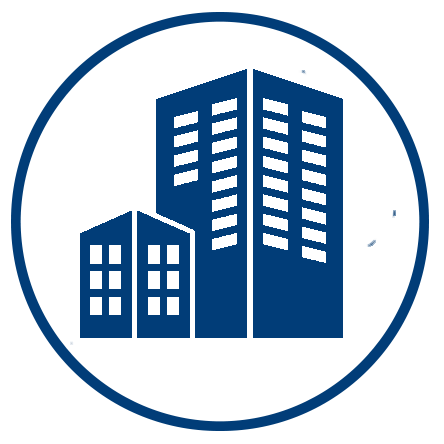 Icon of three tall buildings inside a circle, representing a city or urban area.