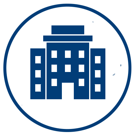 An icon of a building enclosed in a circle.