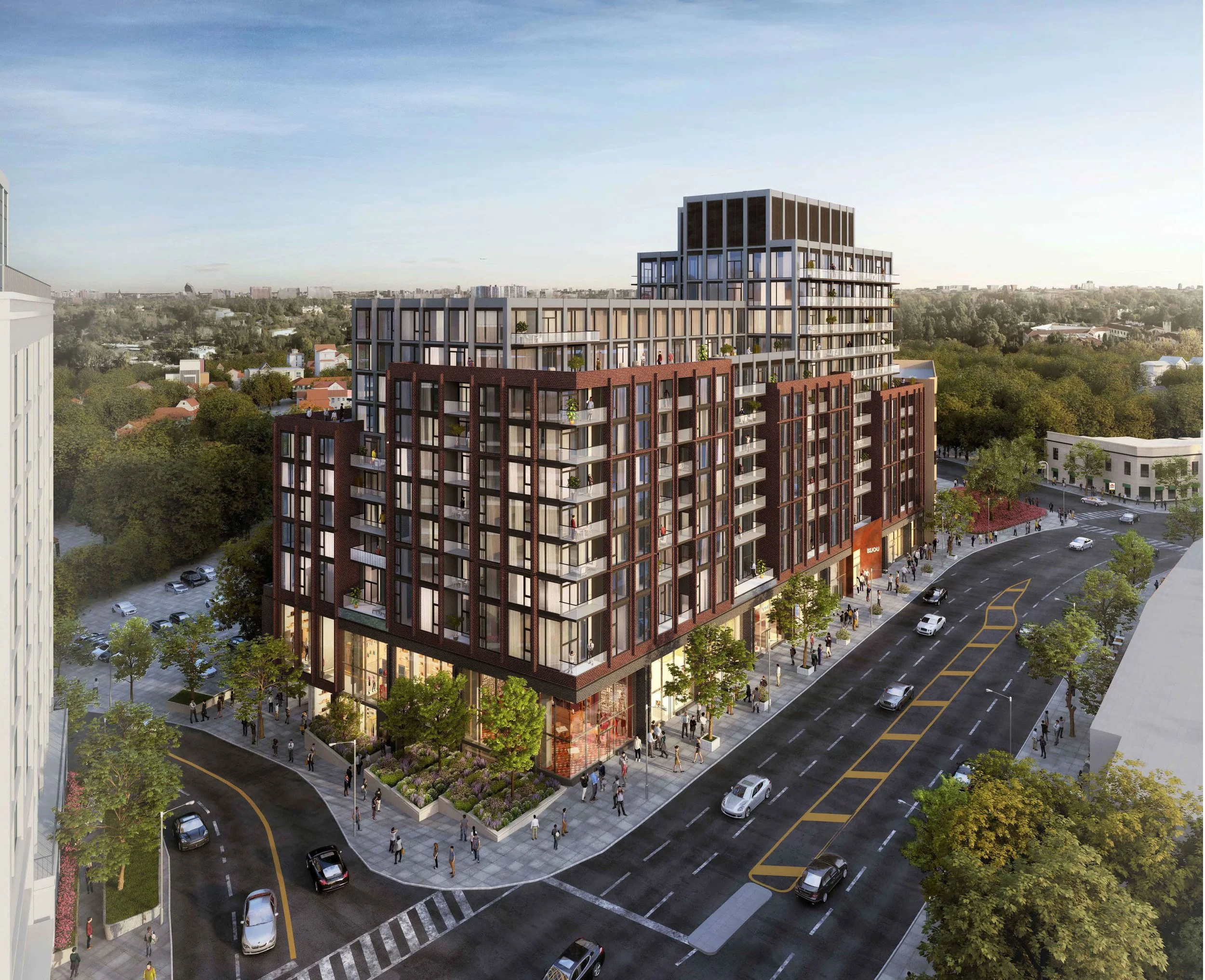 Rendering of a modern multi-story residential building on a city street corner, with people walking on the sidewalk, cars parked along the road, and lush green trees lining the streets.