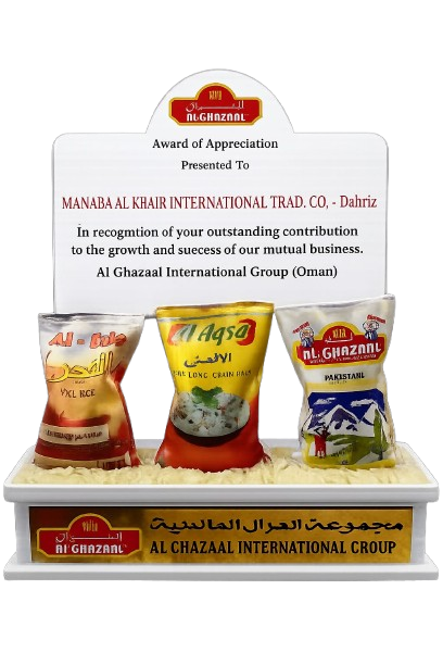 Plaque and three cups of rice in a display stand, recognition award from AL GHAZANI International Group Oman.
