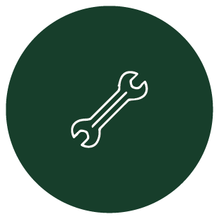Icon of a wrench on a dark green circular background.