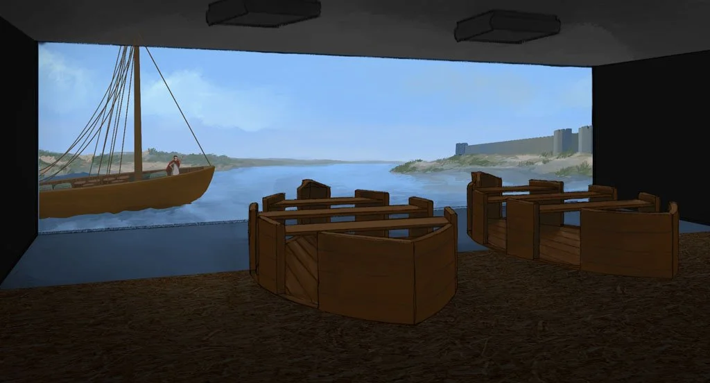 Interior view of a room with a large window overlooking a river, sailboat on the water, and distant buildings and hills.