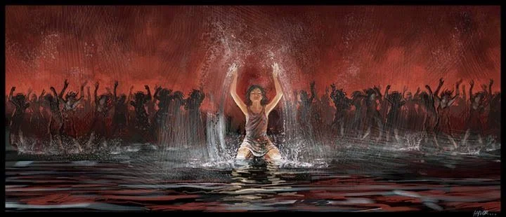 A woman kneeling in water with arms raised in front of a crowd, with splashes around her, at sunset or dusk.