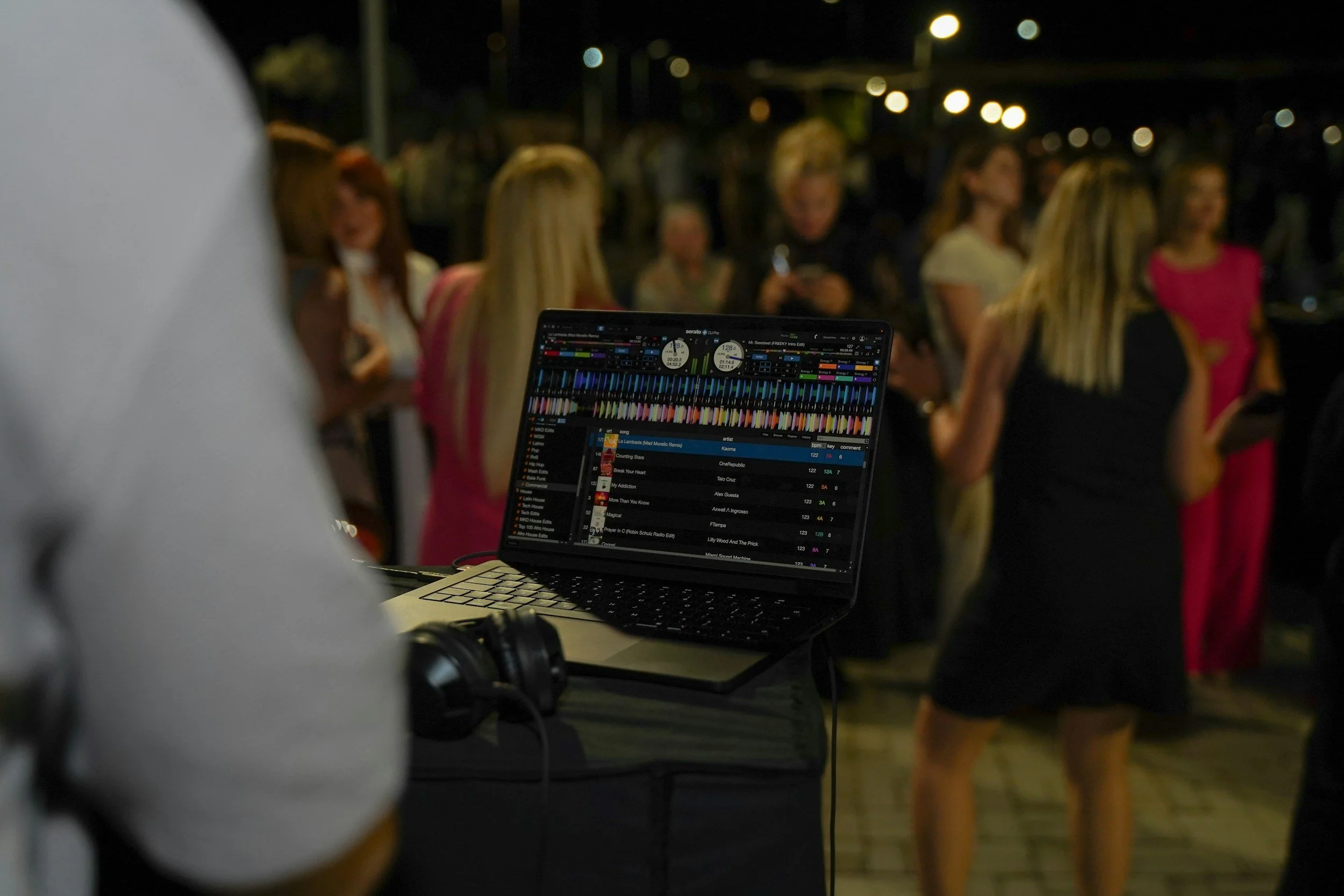 DJ laptop and equipment set up during a Social Sound Co. event in Dallas-Fort Worth