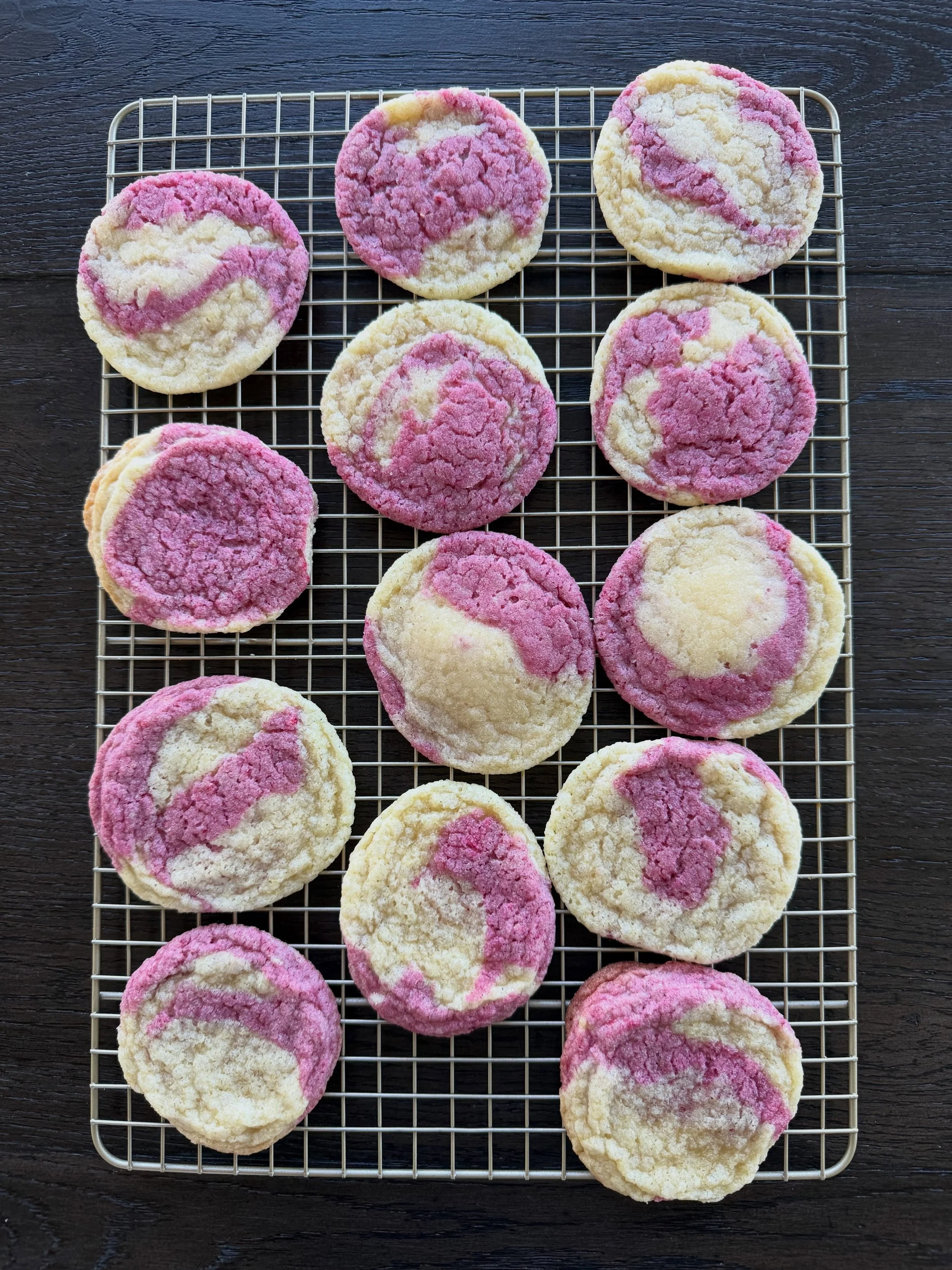 Often when I make cookies, I double the recipe and put half in the freezer. I scoop the dough into balls, place them on a tray, and freeze for about 30 minutes. Then I just throw them into a ziploc bag and label them. They are ready to bake with mayb