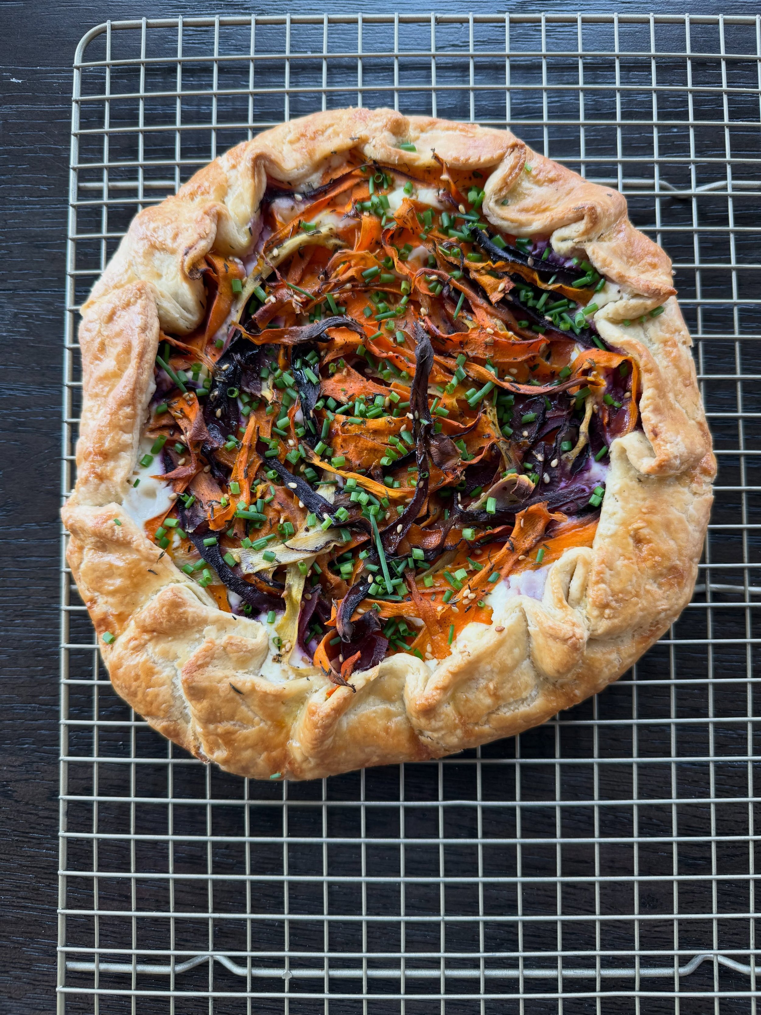 I tested a new galette for future pop ups. Filling is ricotta, feta, and a bit of cream. Topping is shaved carrots mixed with olive oil and za&rsquo;atar (spice mixture of sesame seeds, thyme, sumac, and salt).