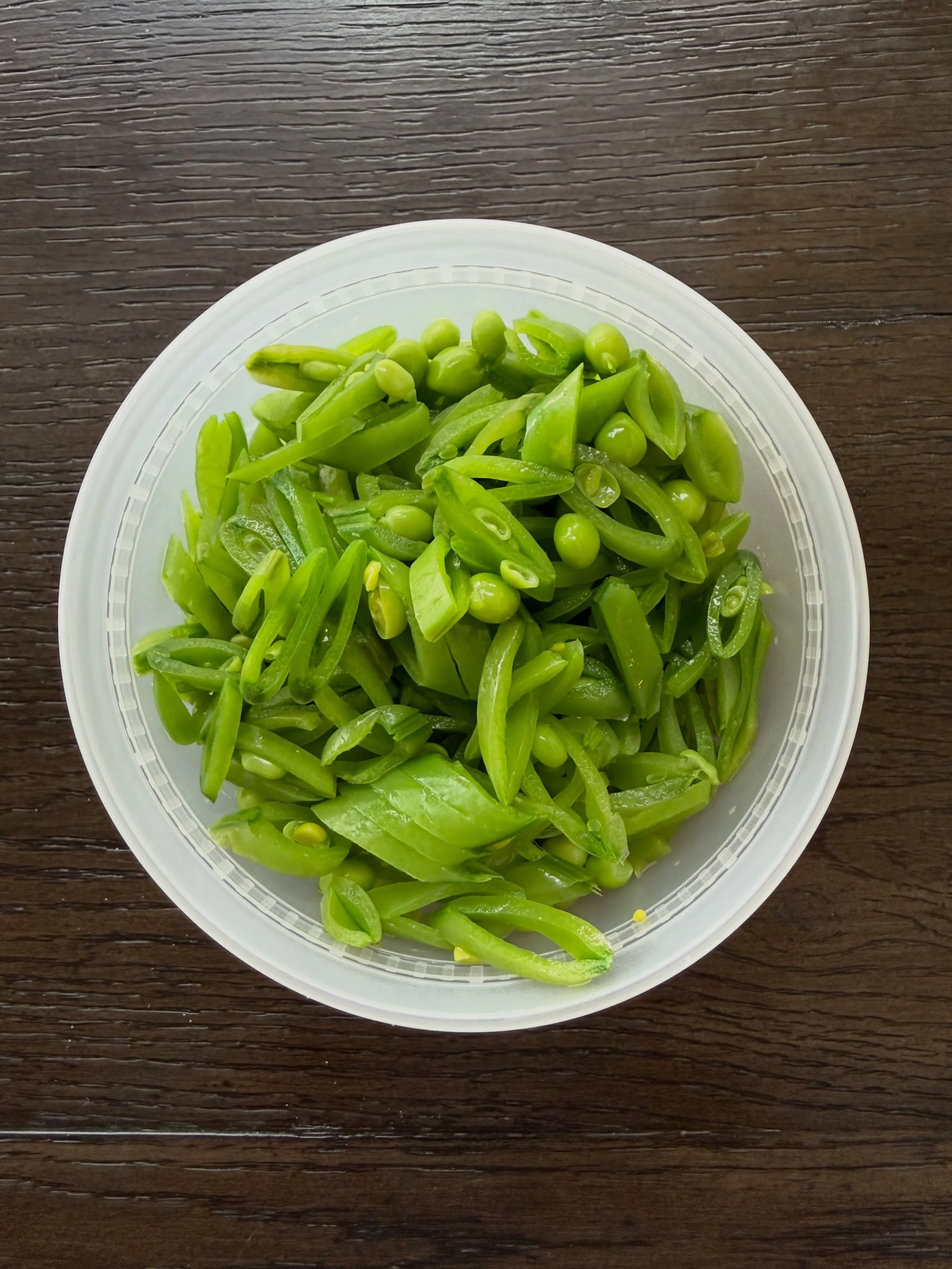 Sliced snap peas going in a salad tomorrow.