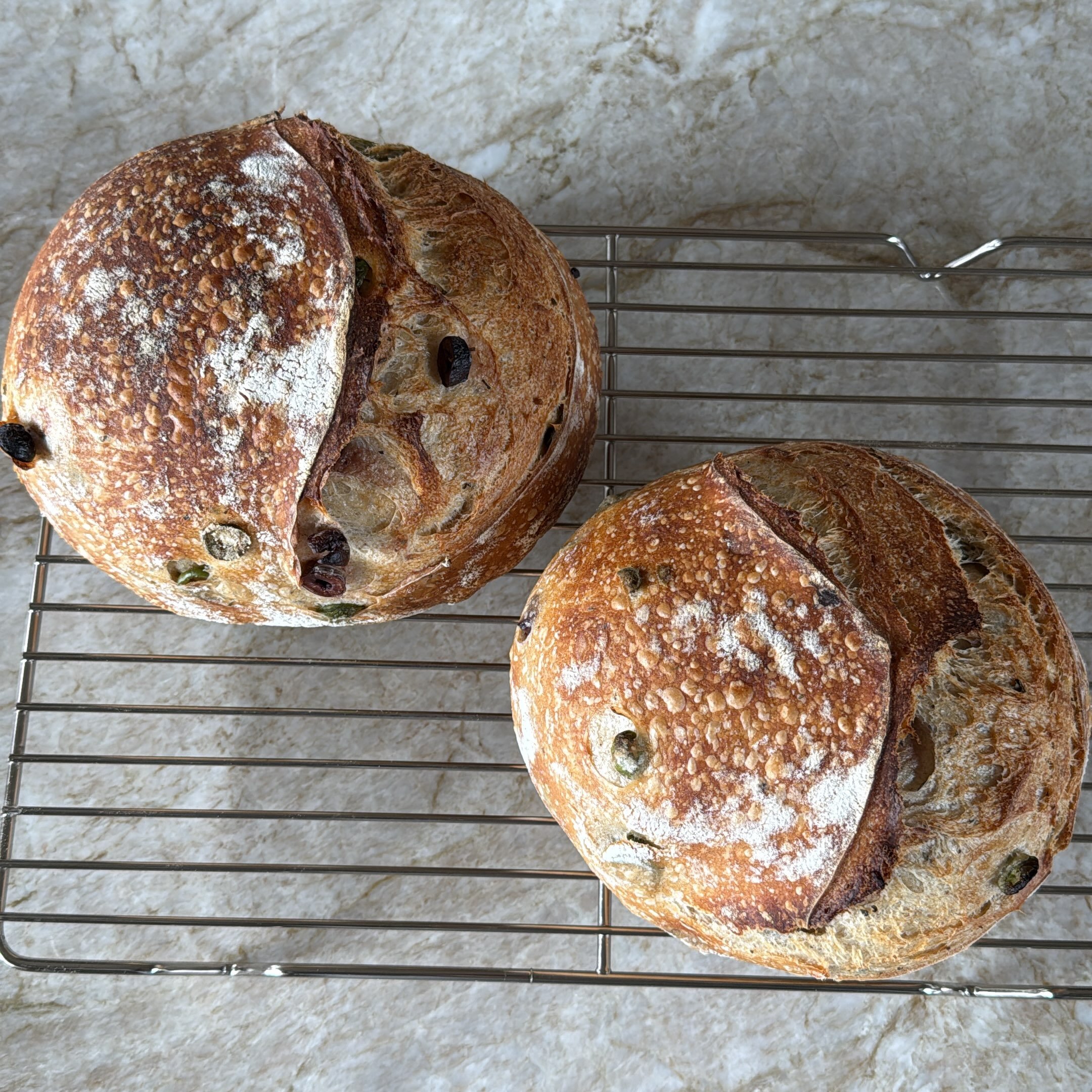 For my last pop up I made regular sourdough boules and also olive sourdough boules. I made fewer of the olive because I realize not everyone wonders if they could live their life without olives. (I wonder if I could live my life without olives.) Surp