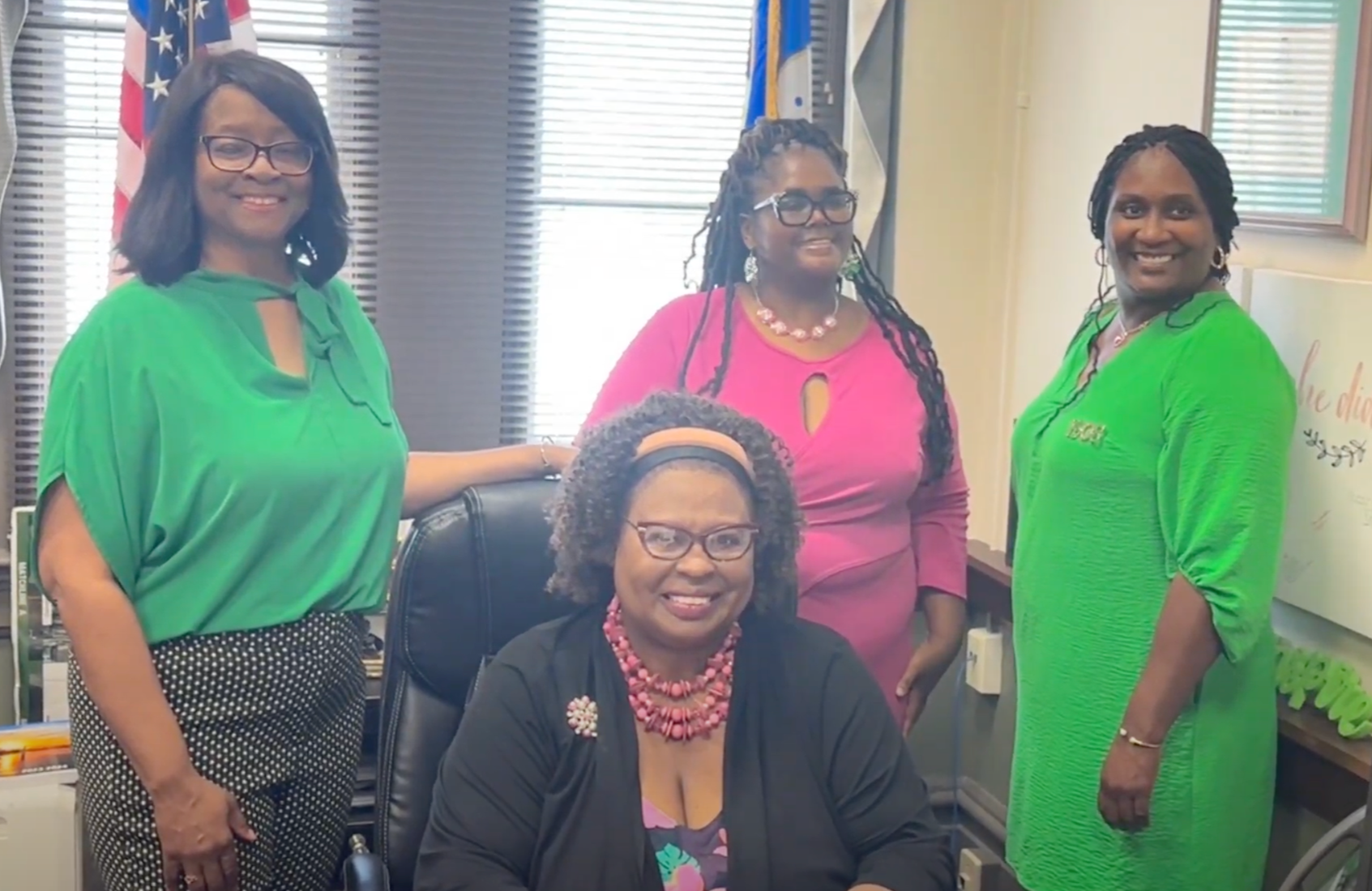 Group Photo of 4 women in an office