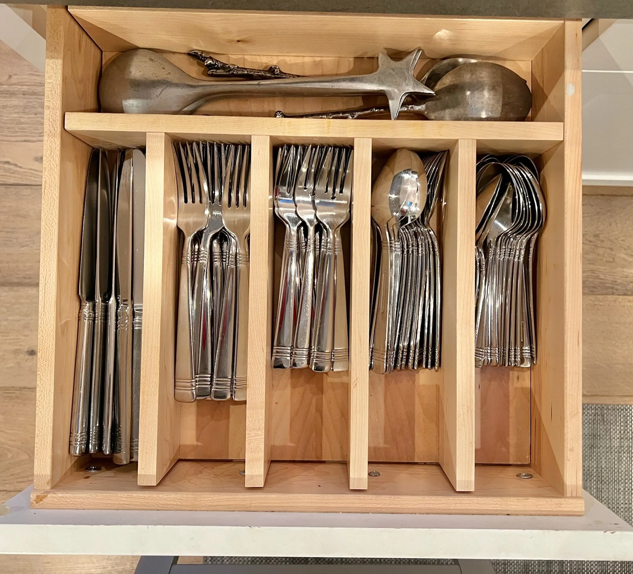 Custom kitchen drawer with dividers for utensils and flatware
