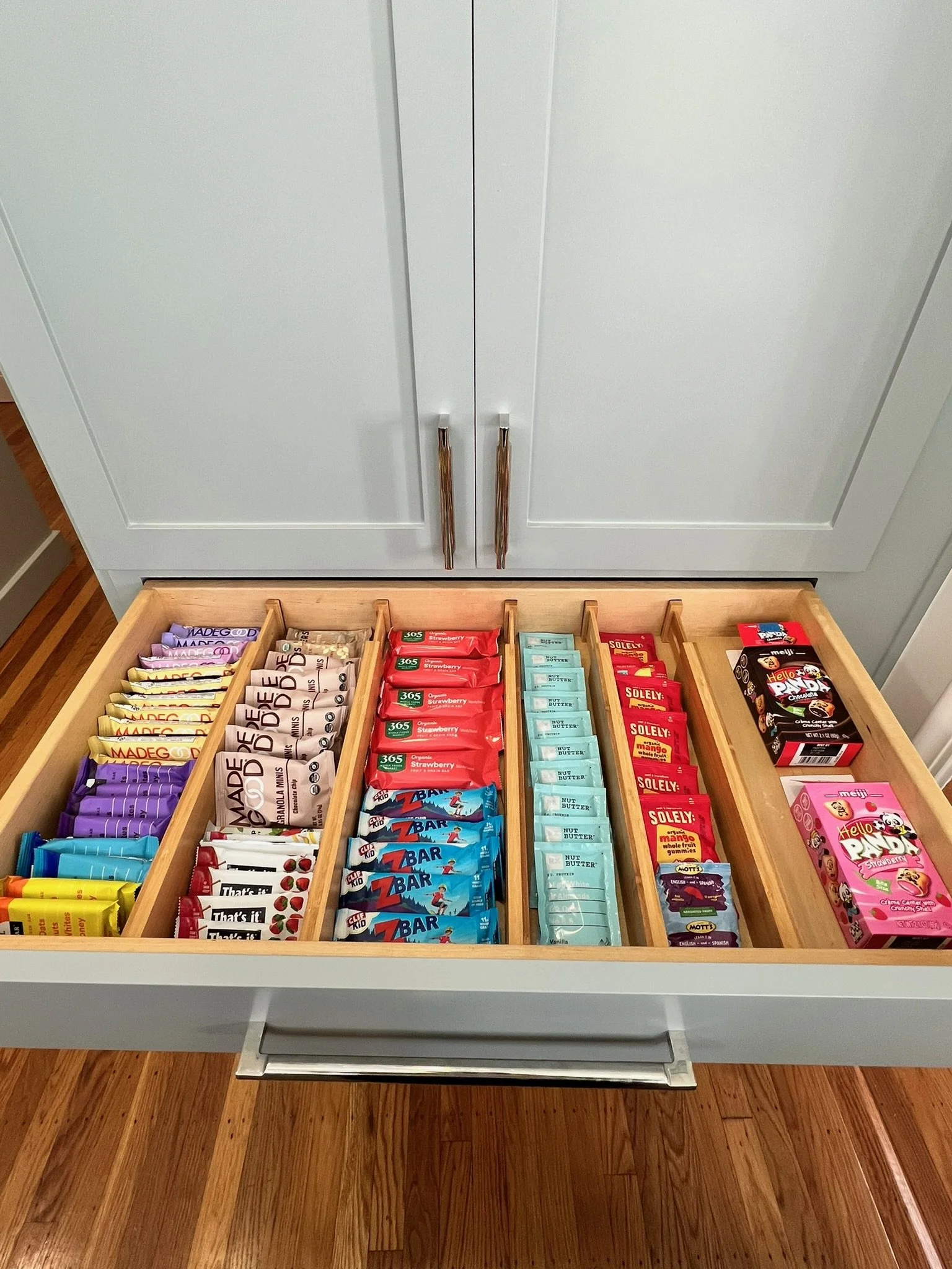 Organized snack drawer with labeled dividers in a Lafayette, California home
