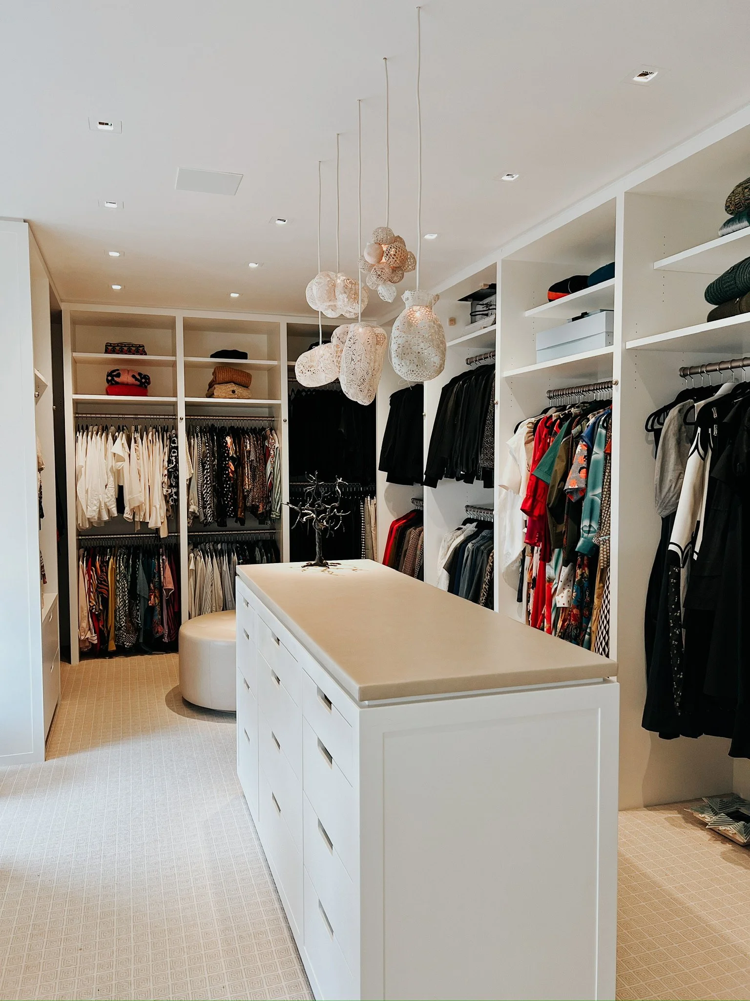 Luxury custom walk-in closet with center island, organized by Spiffy Chicks