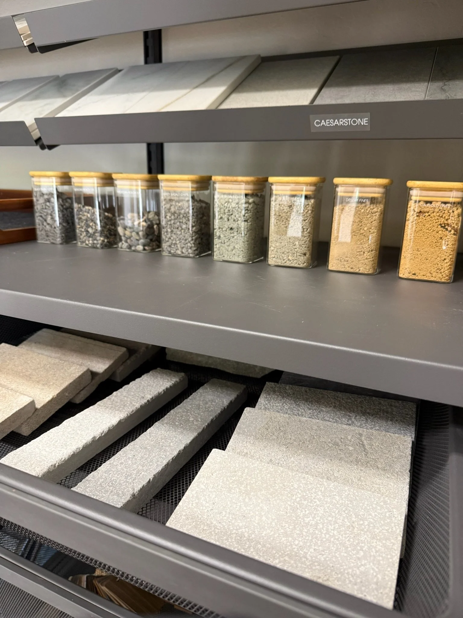 Professionally organized small business shelving of marble and rocks