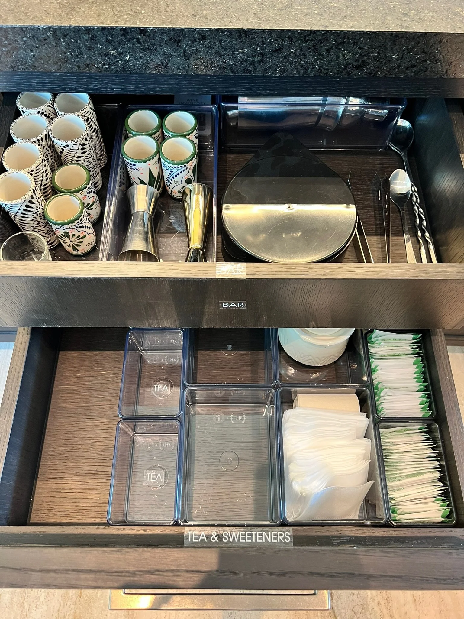 Luxury kitchen drawer with custom dividers for dishes and utensils