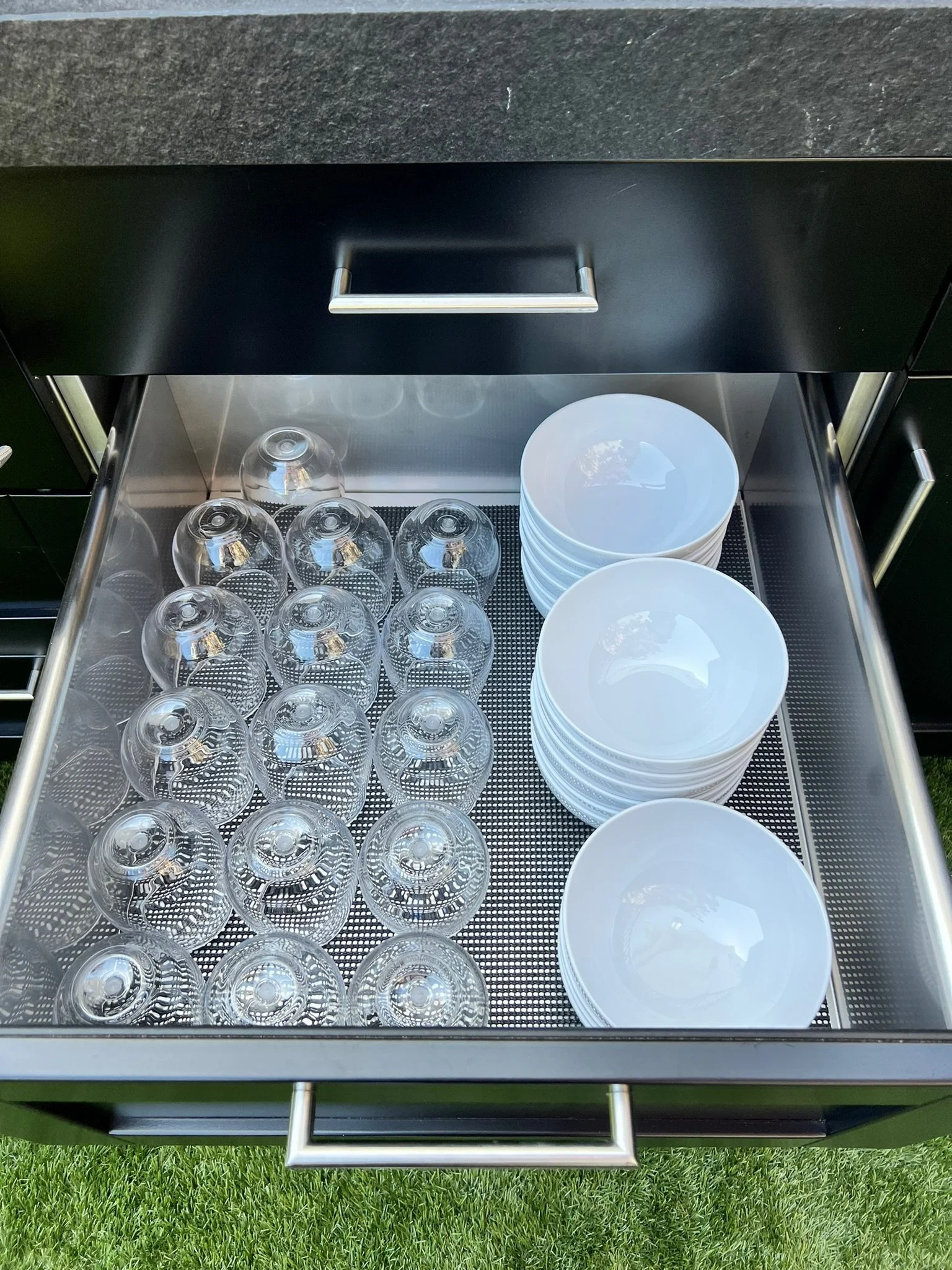 Custom drawer with organized glassware and stemware