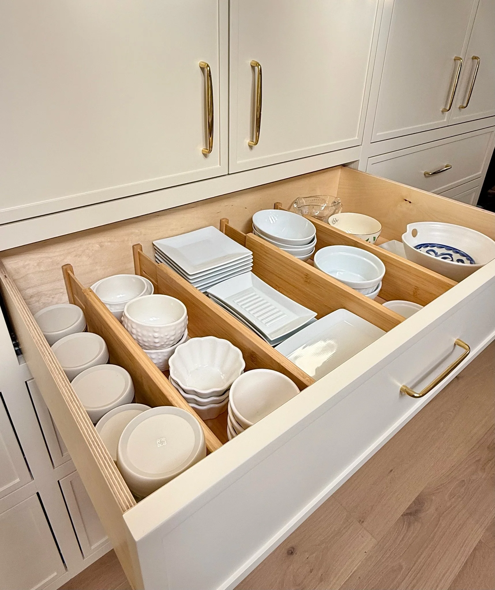 Custom kitchen drawer with dividers for mugs and dishware