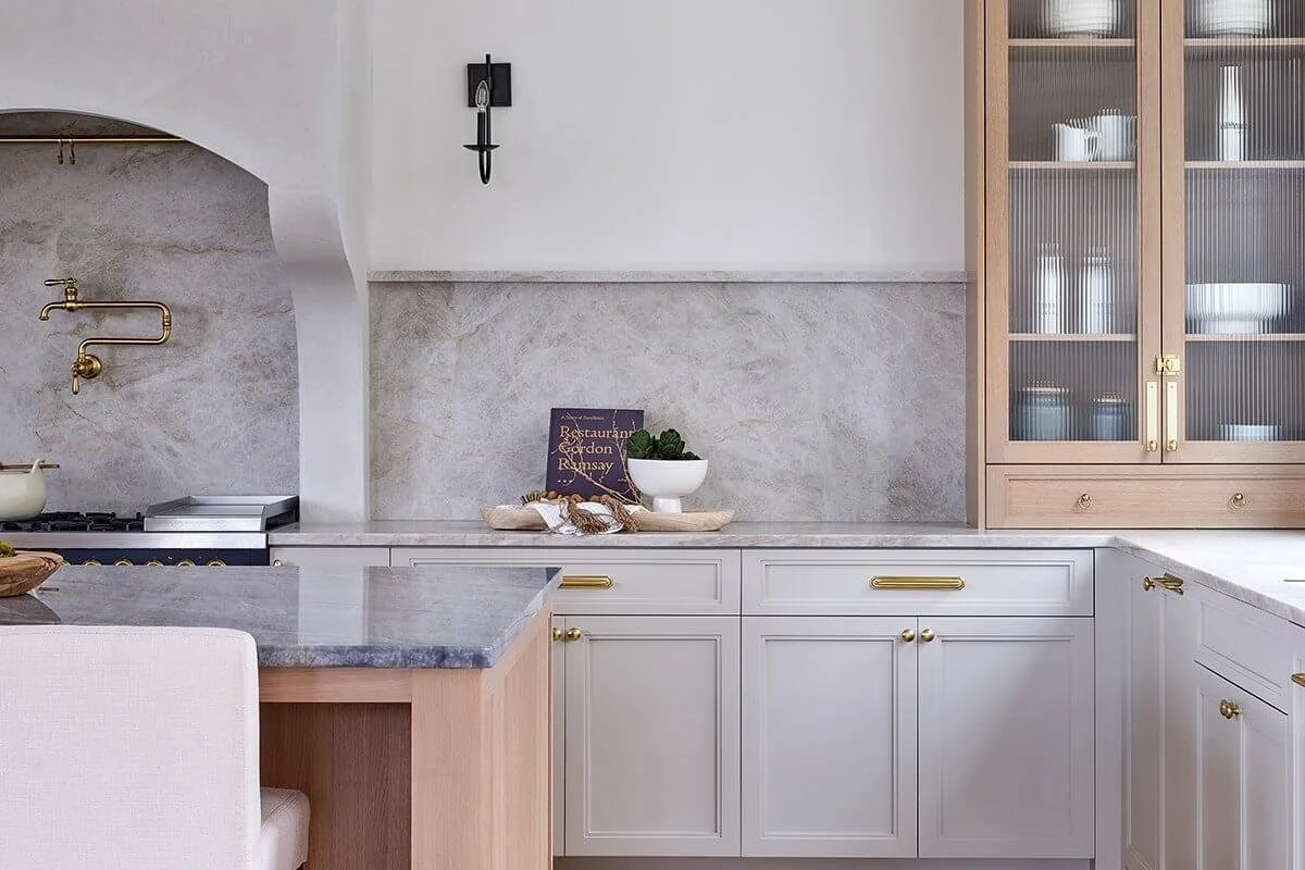 white kitchen cabinet with fluted glass