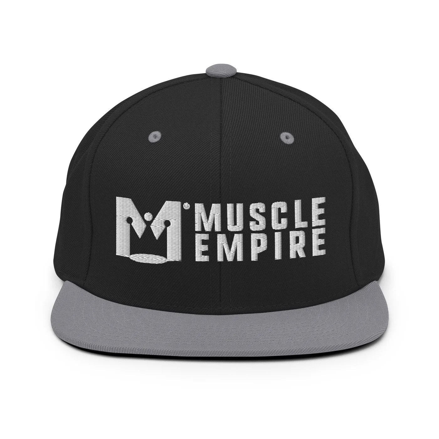 A black and gray trucker cap featuring the logo and text 'Muscle Empire' embroidered on the front.