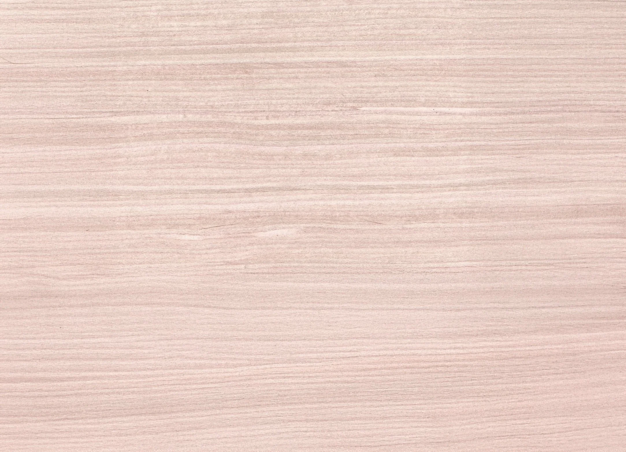 Empty wooden surface with a light pinkish hue
