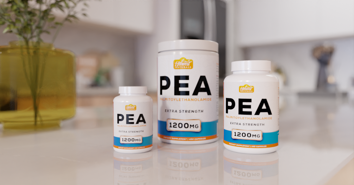 Three bottles of PEA (Palmitoylethanolamide) dietary supplement on a kitchen countertop, with a yellow vase with green foliage in the background.