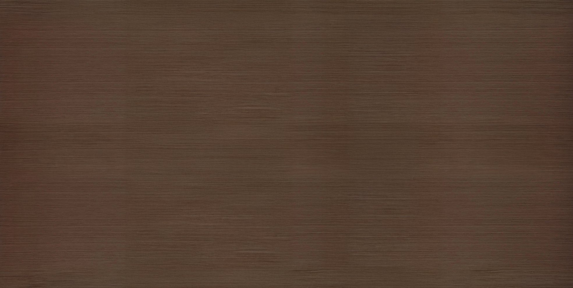 Close-up of a polished wooden surface with a rich brown color and horizontal grain pattern.